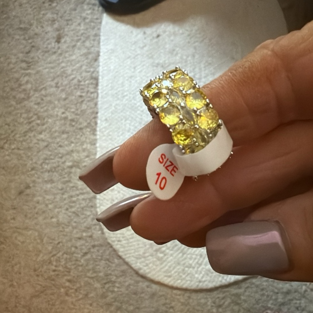 Dazzling Silver Ring with Yellow Accents